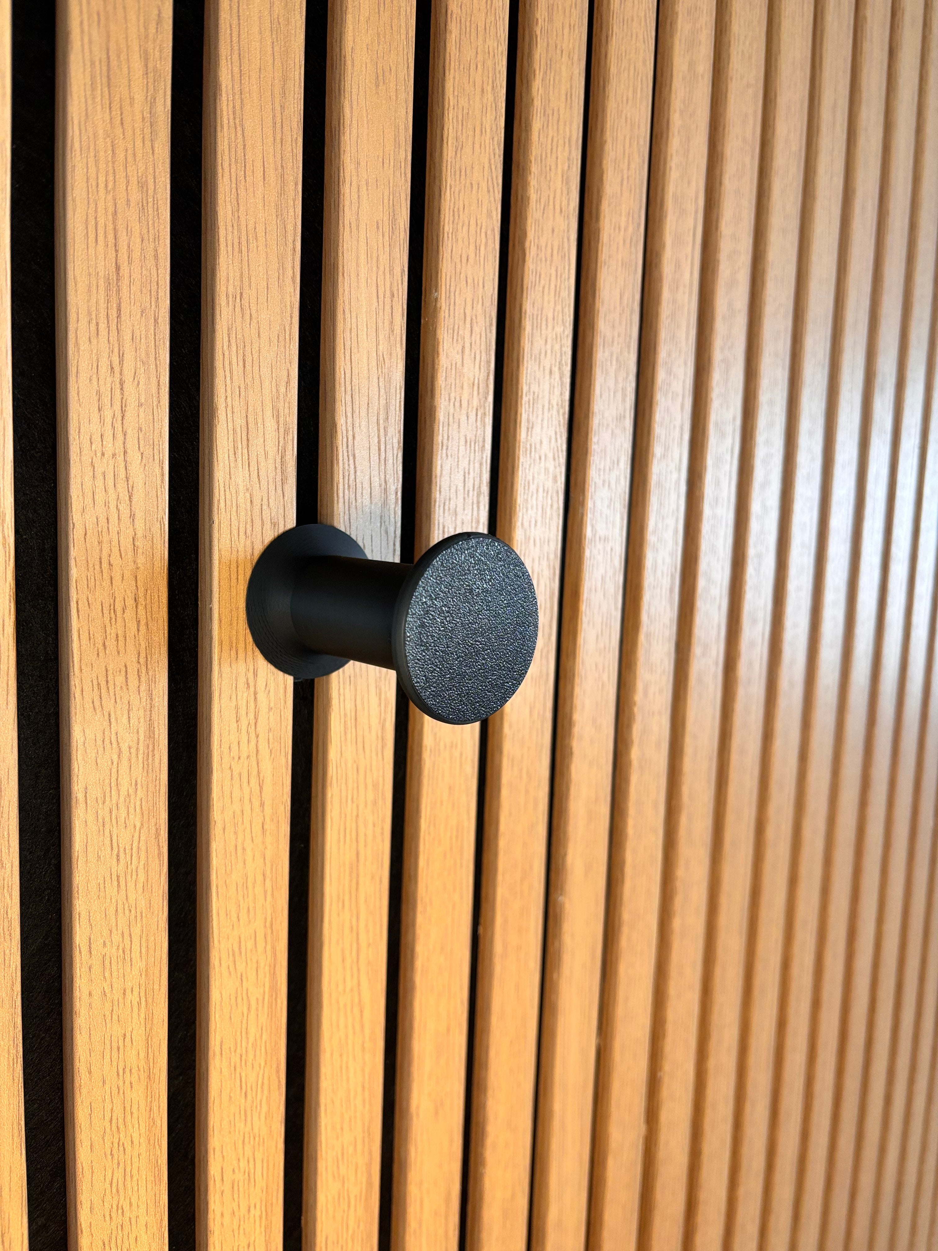 Headsethållare för akustikpaneler