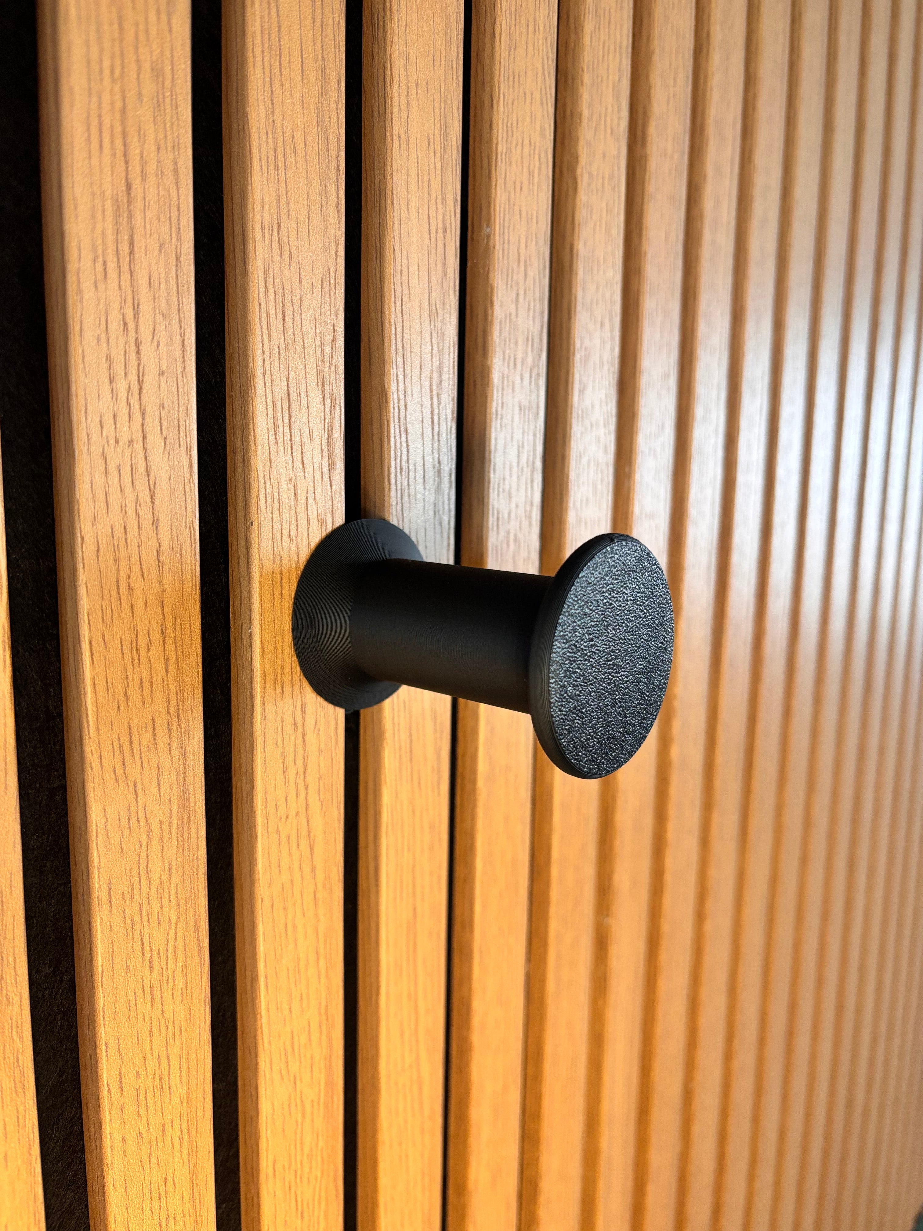 Headsethållare för akustikpaneler