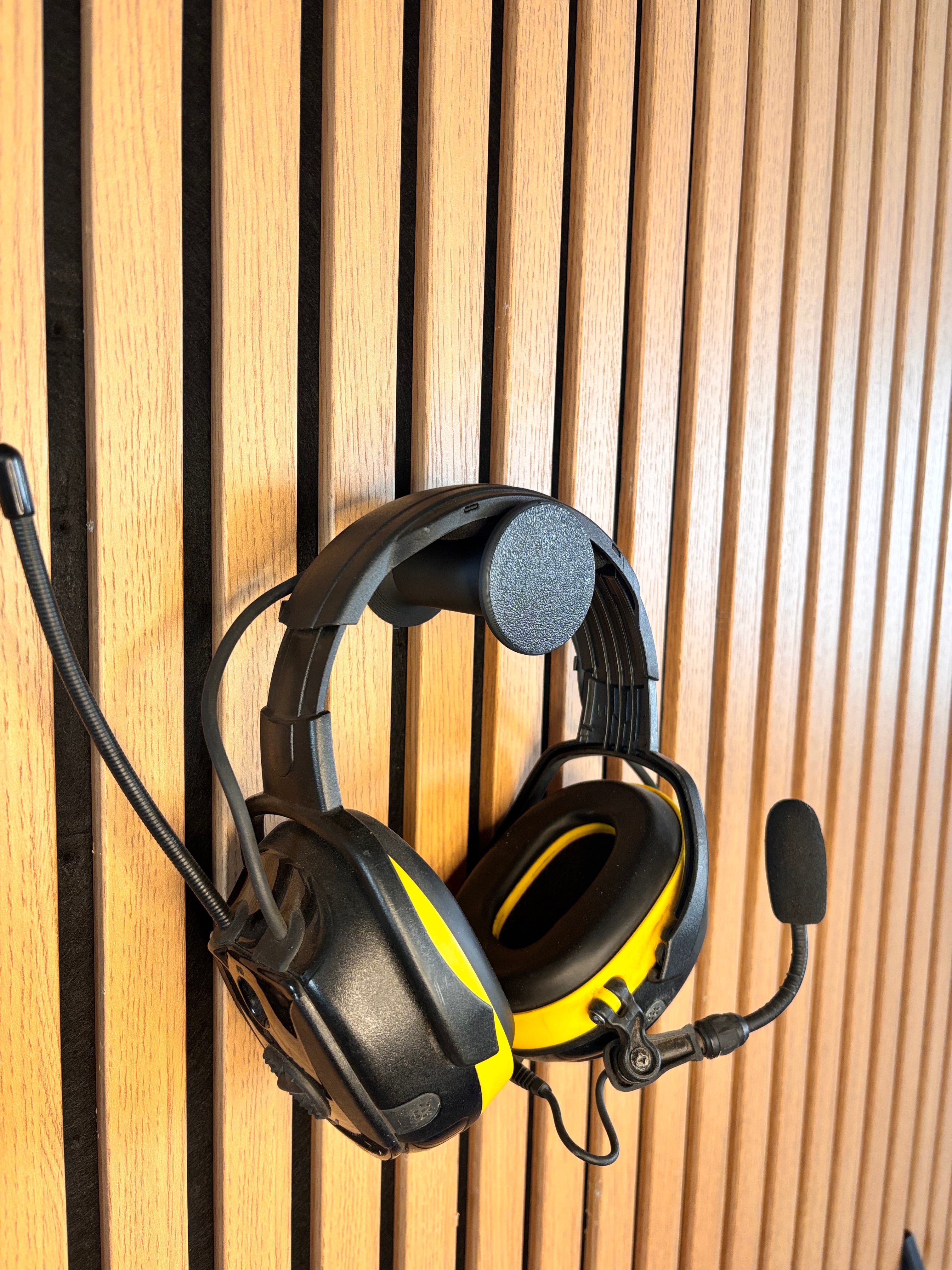 Headsethållare för akustikpaneler