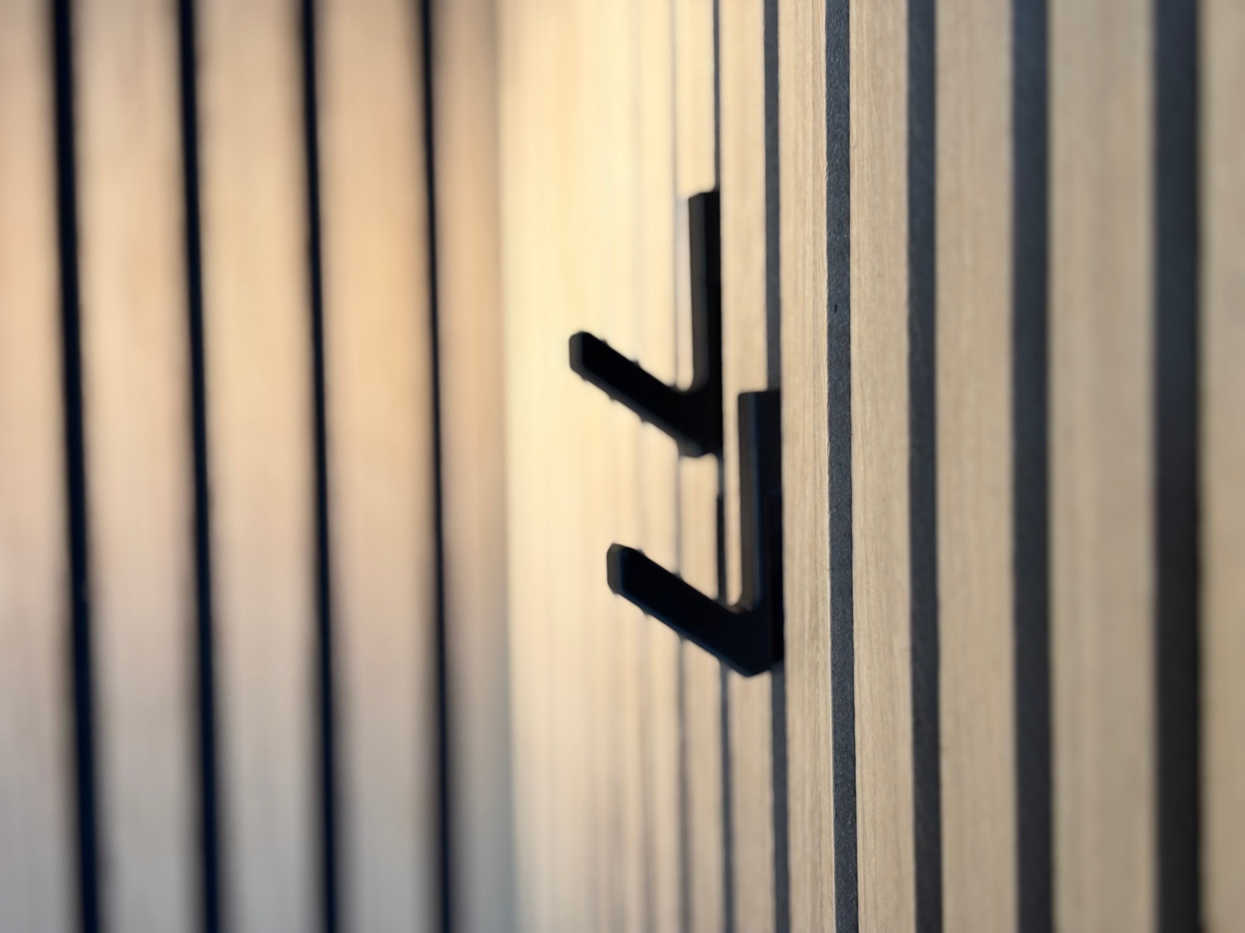 Trapezformad krok för akustikpaneler