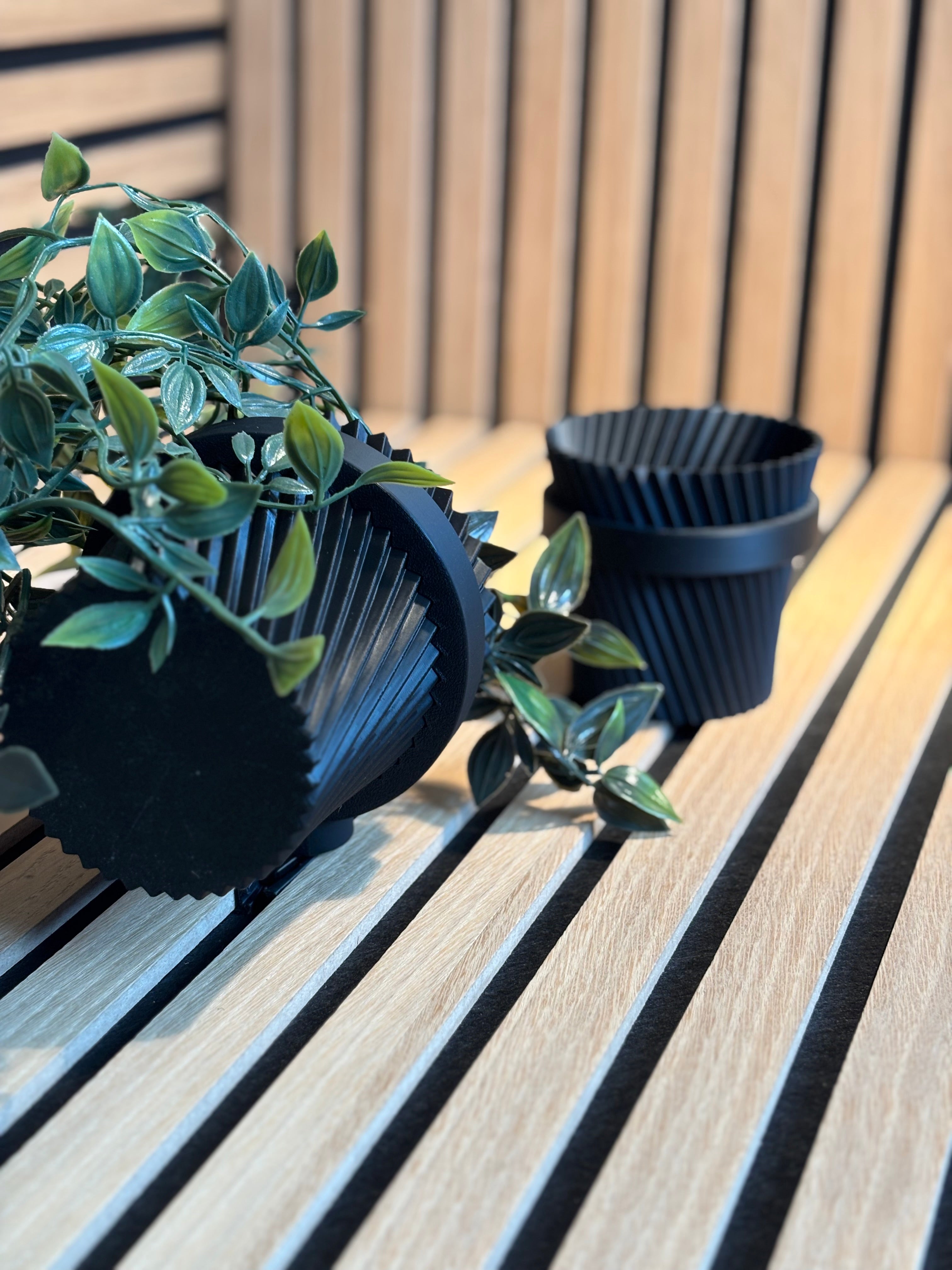 Vaas för vertikal upphängning för akustikpaneler